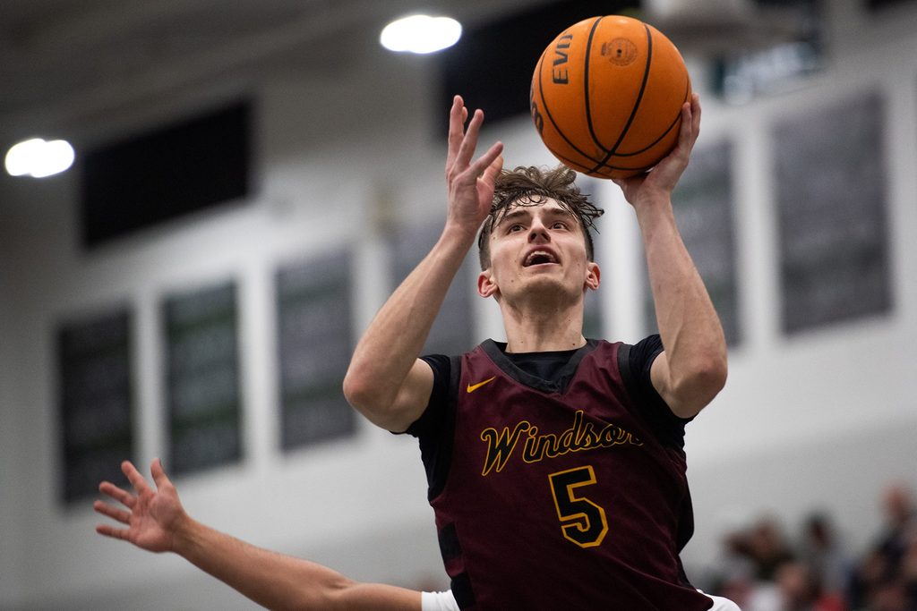 Windsor's Madden Smiley goes up for a basket during a league rivalry high school basketball doubleheader vs. Fossil Ridge on Feb. 6, 2026 at Fossil Ridge High School in Fort Collins, Colo.
