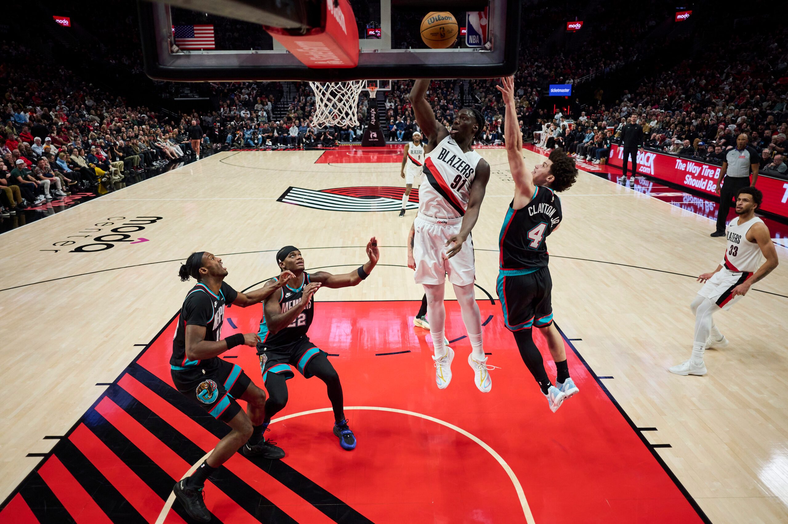 Feb 6, 2026; Portland, Oregon, USA; Portland Trail Blazers guard Sidy Cissoko (91) dunks the basketball during the second half against Memphis Grizzlies guard Walter Claytong Jr. (4) at Moda Center. Mandatory Credit: Troy Wayrynen-Imagn Images