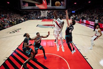 Feb 6, 2026; Portland, Oregon, USA; Portland Trail Blazers guard Sidy Cissoko (91) dunks the basketball during the second half against Memphis Grizzlies guard Walter Claytong Jr. (4) at Moda Center. Mandatory Credit: Troy Wayrynen-Imagn Images