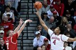 Feb 7, 2026; Bloomington, Indiana, USA; Indiana Hoosiers forward Sam Alexis (4) blocks a shot attempt from Wisconsin Badgers guard Andrew Rohde (7) during the first half at Simon Skjodt Assembly Hall. Mandatory Credit: Robert Goddin-Imagn Images