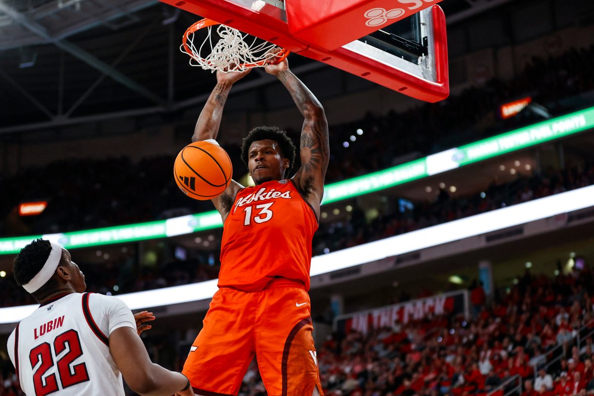 Feb 7, 2026; Raleigh, North Carolina, USA; Virginia Tech Hokies forward Amani Hansberry (13) dunks the ball during the second half of the game against the NC State Wolfpack at Lenovo Center. Mandatory Credit: Jaylynn Nash-Imagn Images