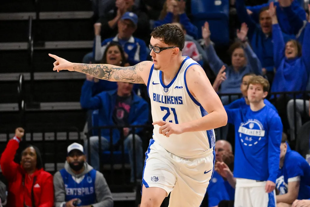 Feb 7, 2026; St. Louis, Missouri, USA; Saint Louis Billikens center Robbie Avila (21) reacts after making a three point shot against the La Salle Explorers during the second half at Chaifetz Arena. Mandatory Credit: Jeff Curry-Imagn Images