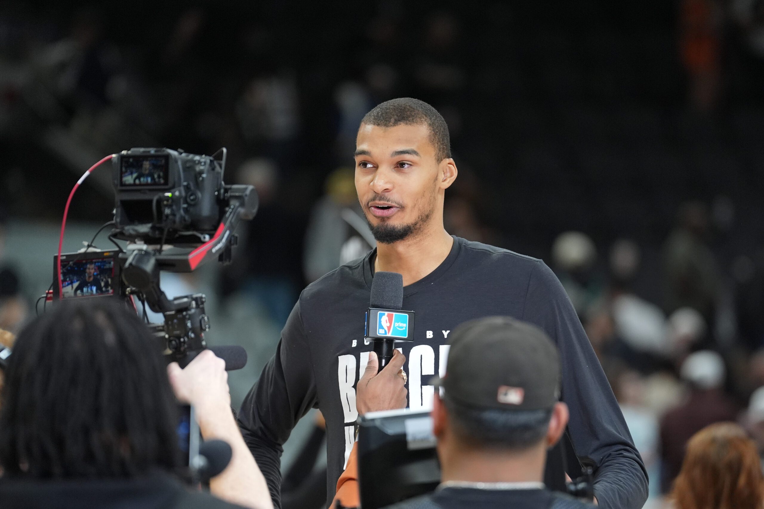 Feb 7, 2026; San Antonio, Texas, USA;  San Antonio Spurs forward Victor Wembanyama (1) gives an interview after the game against the Dallas Mavericks at Frost Bank Center. Mandatory Credit: Daniel Dunn-Imagn Images