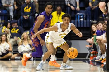 Feb 7, 2026; Berkeley, California, USA; California Golden Bears guard Semetri (TT) Carr (3) goes to recover a loose ball after it was knocked away by Clemson Tigers guard Ace Buckner (21) during the first half at Haas Pavilion. Mandatory Credit: D. Ross Cameron-Imagn Images