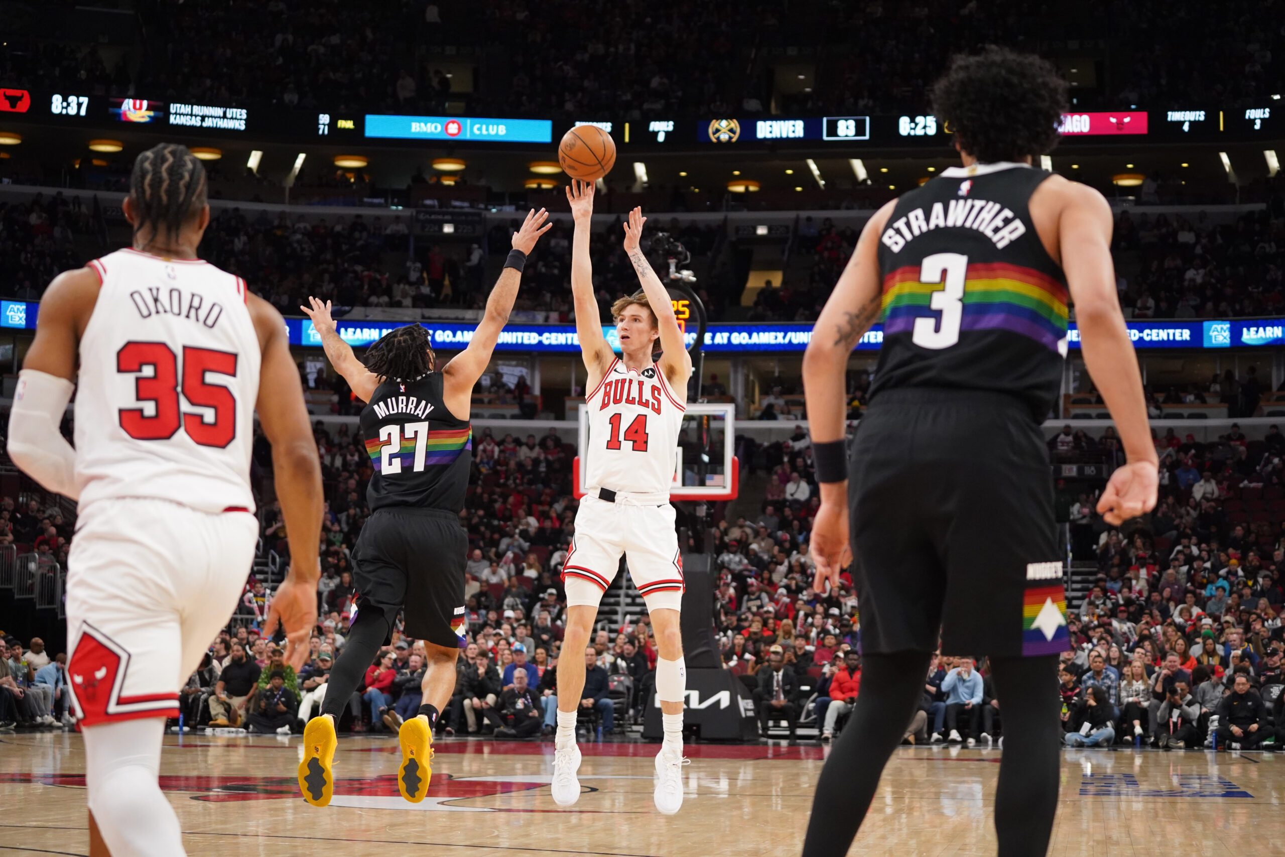 Feb 7, 2026; Chicago, Illinois, USA; Chicago Bulls forward Matas Buzelis (14) shoots over Denver Nuggets guard Jamal Murray (27) during the second half at United Center. Mandatory Credit: David Banks-Imagn Images