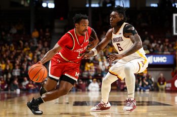 Feb 8, 2026; Minneapolis, Minnesota, USA; Maryland Terrapins guard David Coit (8) works around Minnesota Golden Gophers guard Langston Reynolds (6) during the second half at Williams Arena. Mandatory Credit: Matt Krohn-Imagn Images