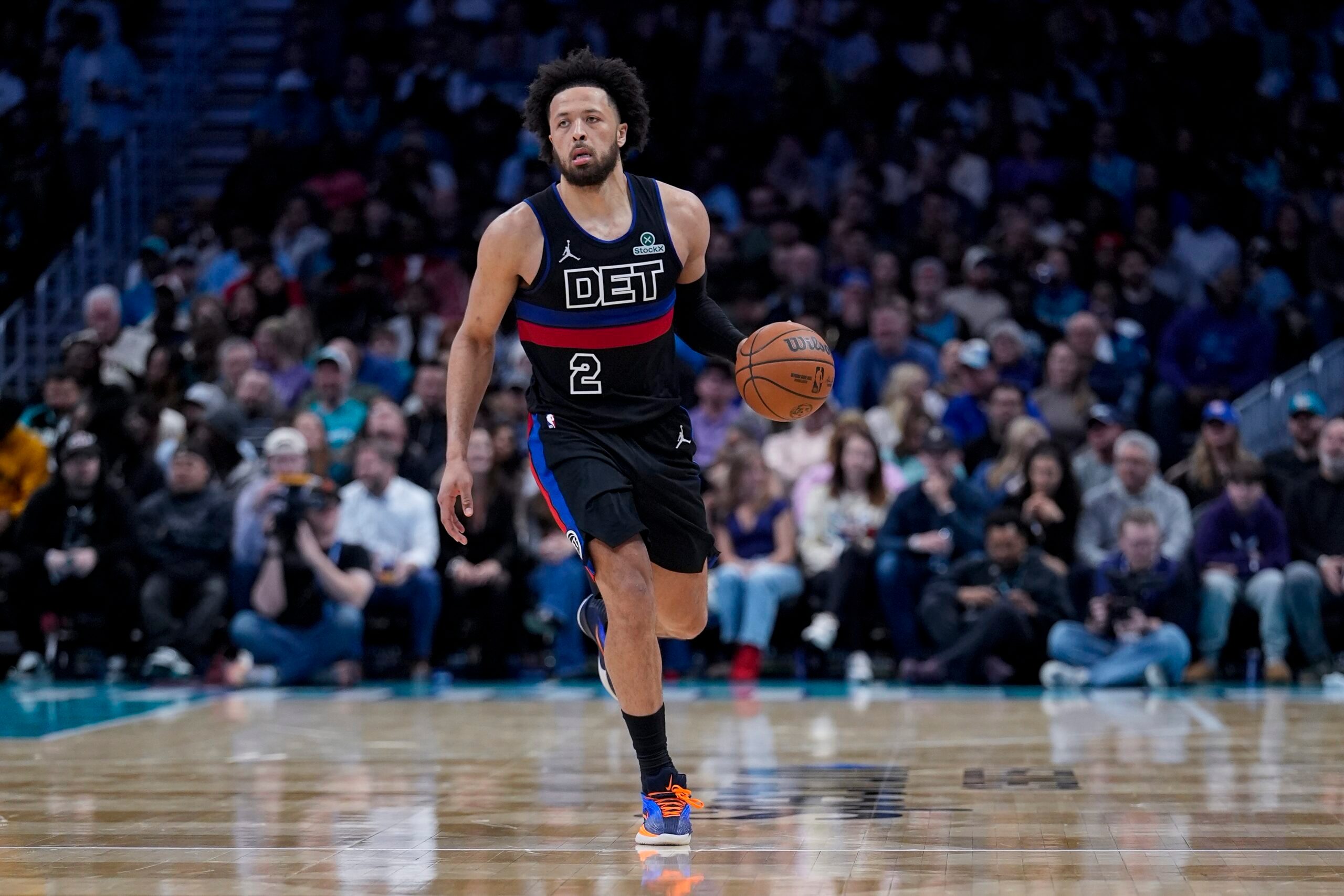 Feb 9, 2026; Charlotte, North Carolina, USA; Detroit Pistons guard Cade Cunningham (2) brings the ball up court during the second half against the Charlotte Hornets at Spectrum Center. Mandatory Credit: Jim Dedmon-Imagn Images