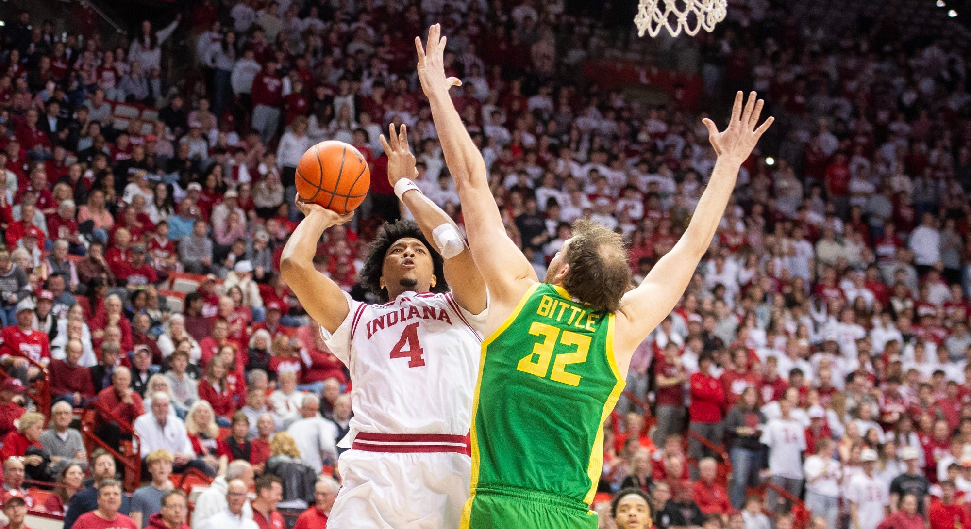 Indiana's Sam Alexis (4) shoots over Oregon's Nate Bittle (32) during the Indiana versus Oregon men's basketball game at Simon Skjodt Assembly Hall on Monday, Feb. 9, 2026.