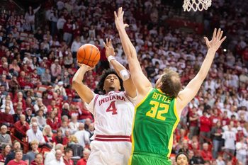 Indiana's Sam Alexis (4) shoots over Oregon's Nate Bittle (32) during the Indiana versus Oregon men's basketball game at Simon Skjodt Assembly Hall on Monday, Feb. 9, 2026.
