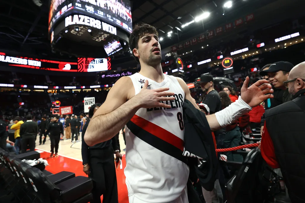 Feb 9, 2026; Portland, Oregon, USA; Portland Trail Blazers forward Deni Avdija (8) heads to the locker room after the Trail Blazers defeat 76ers 135-118 during the second half at Moda Center. Mandatory Credit: Jaime Valdez-Imagn Images