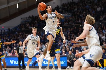 Feb 10, 2026; Villanova, Pennsylvania, USA; Villanova Wildcats guard Bryce Lindsay (2) drives to shoot against Marquette Golden Eagles forward Ben Gold (12) in the first half at William B. Finneran Pavilion. Mandatory Credit: Kyle Ross-Imagn Images