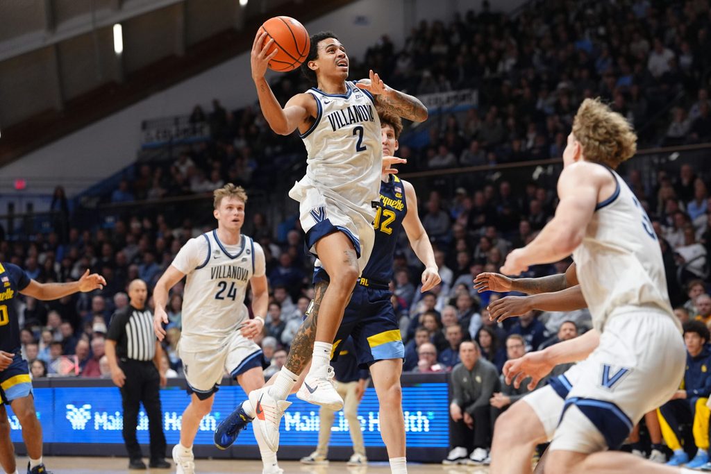 Feb 10, 2026; Villanova, Pennsylvania, USA; Villanova Wildcats guard Bryce Lindsay (2) drives to shoot against Marquette Golden Eagles forward Ben Gold (12) in the first half at William B. Finneran Pavilion. Mandatory Credit: Kyle Ross-Imagn Images