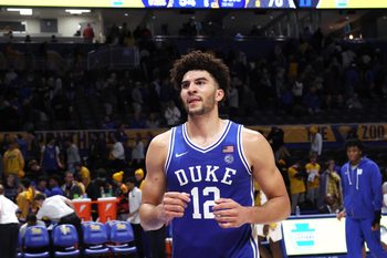 Feb 10, 2026; Pittsburgh, Pennsylvania, USA;  Duke Blue Devils forward Cameron Boozer (12) exits the court after defeating the Pittsburgh Panthers at Petersen Events Center. Mandatory Credit: Charles LeClaire-Imagn Images