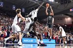 Feb 10, 2026; Spokane, Washington, USA; Washington State Cougars forward Eemeli Yalaho (2) shoots the ball against Gonzaga Bulldogs guard Tyon Grant-Foster (7) in the second half at McCarthey Athletic Center. Mandatory Credit: James Snook-Imagn Images