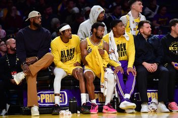 Feb 10, 2026; Los Angeles, California, USA; Los Angeles Lakers forward LeBron James (23) forward Jarred Vanderbilt (2) guard Bronny James (9) and forward Rui Hachimura (28) watch game action during the second half at Crypto.com Arena. Mandatory Credit: Gary A. Vasquez-Imagn Images