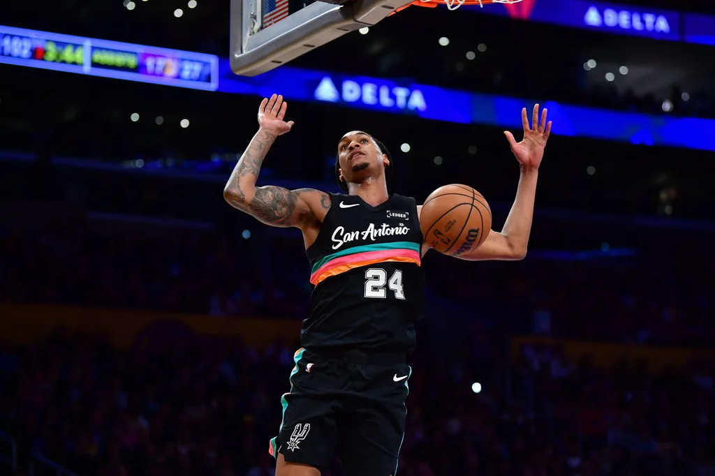 Feb 10, 2026; Los Angeles, California, USA; San Antonio Spurs guard Devin Vassell (24) scores a basket against the Los Angeles Lakers during the second half at Crypto.com Arena. Mandatory Credit: Gary A. Vasquez-Imagn Images