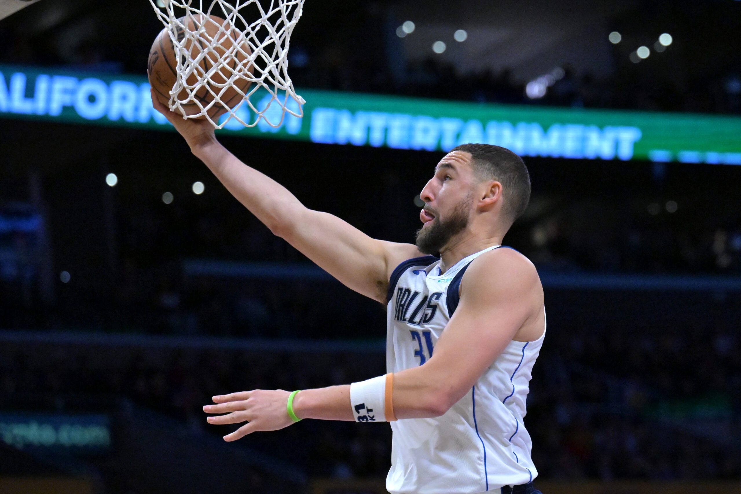 Feb 12, 2026; Los Angeles, California, USA;  Dallas Mavericks guard Klay Thompson (31) drives for a basket in the second half against the Los Angeles Lakers at Crypto.com Arena. Mandatory Credit: Jayne Kamin-Oncea-Imagn Images