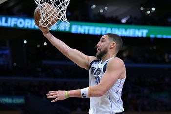Feb 12, 2026; Los Angeles, California, USA;  Dallas Mavericks guard Klay Thompson (31) drives for a basket in the second half against the Los Angeles Lakers at Crypto.com Arena. Mandatory Credit: Jayne Kamin-Oncea-Imagn Images