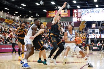 Feb 13, 2026; Chicago, Illinois, USA; Saint Louis Billikens guard Kellen Thames (0) drives to the basket against the Loyola Chicago Ramblers during the first half at Joseph J. Gentile Arena. Mandatory Credit: Kamil Krzaczynski-Imagn Images