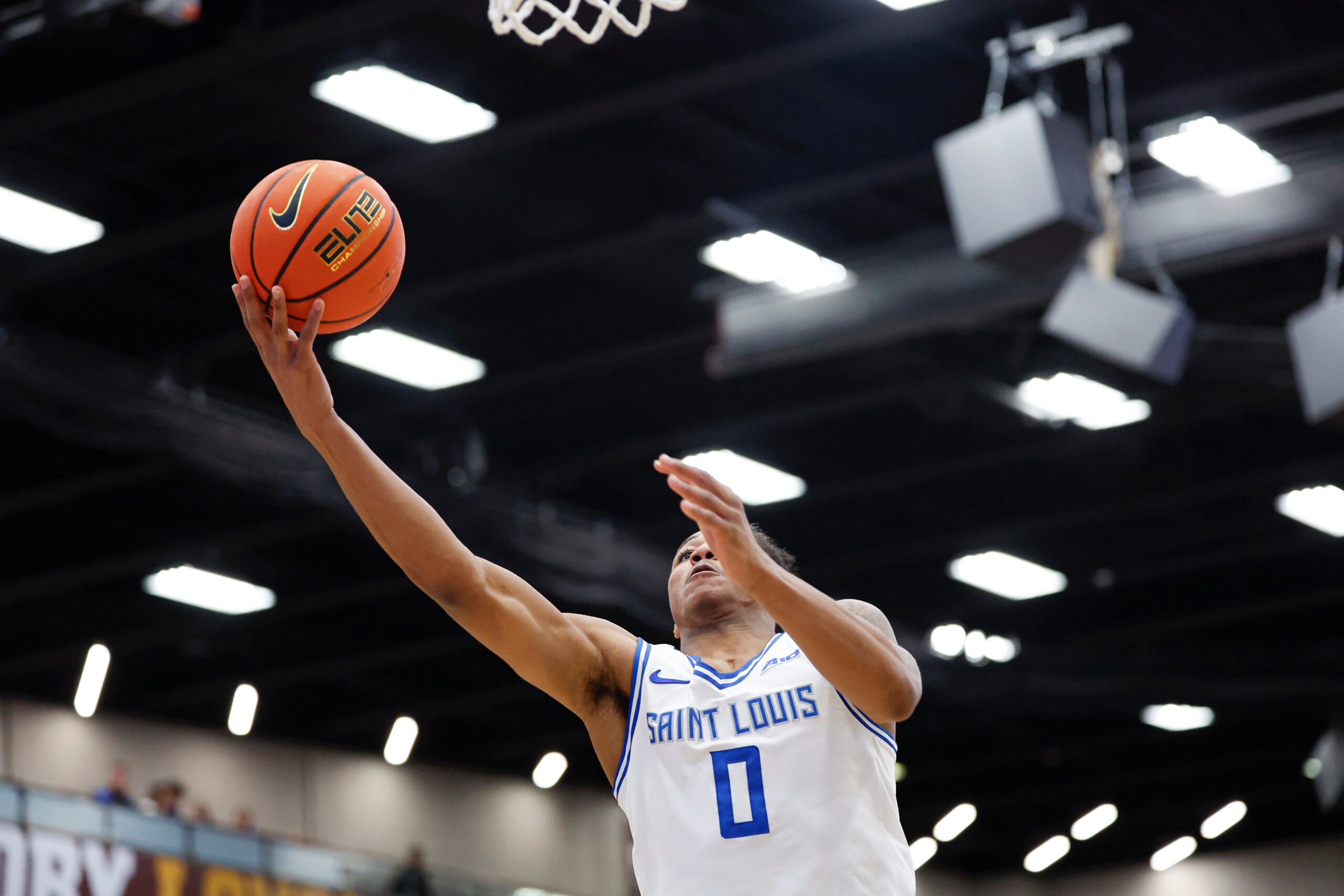 Feb 13, 2026; Chicago, Illinois, USA; Saint Louis Billikens guard Kellen Thames (0) goes to the basket against the Loyola Chicago Ramblers  during the first half at Joseph J. Gentile Arena. Mandatory Credit: Kamil Krzaczynski-Imagn Images