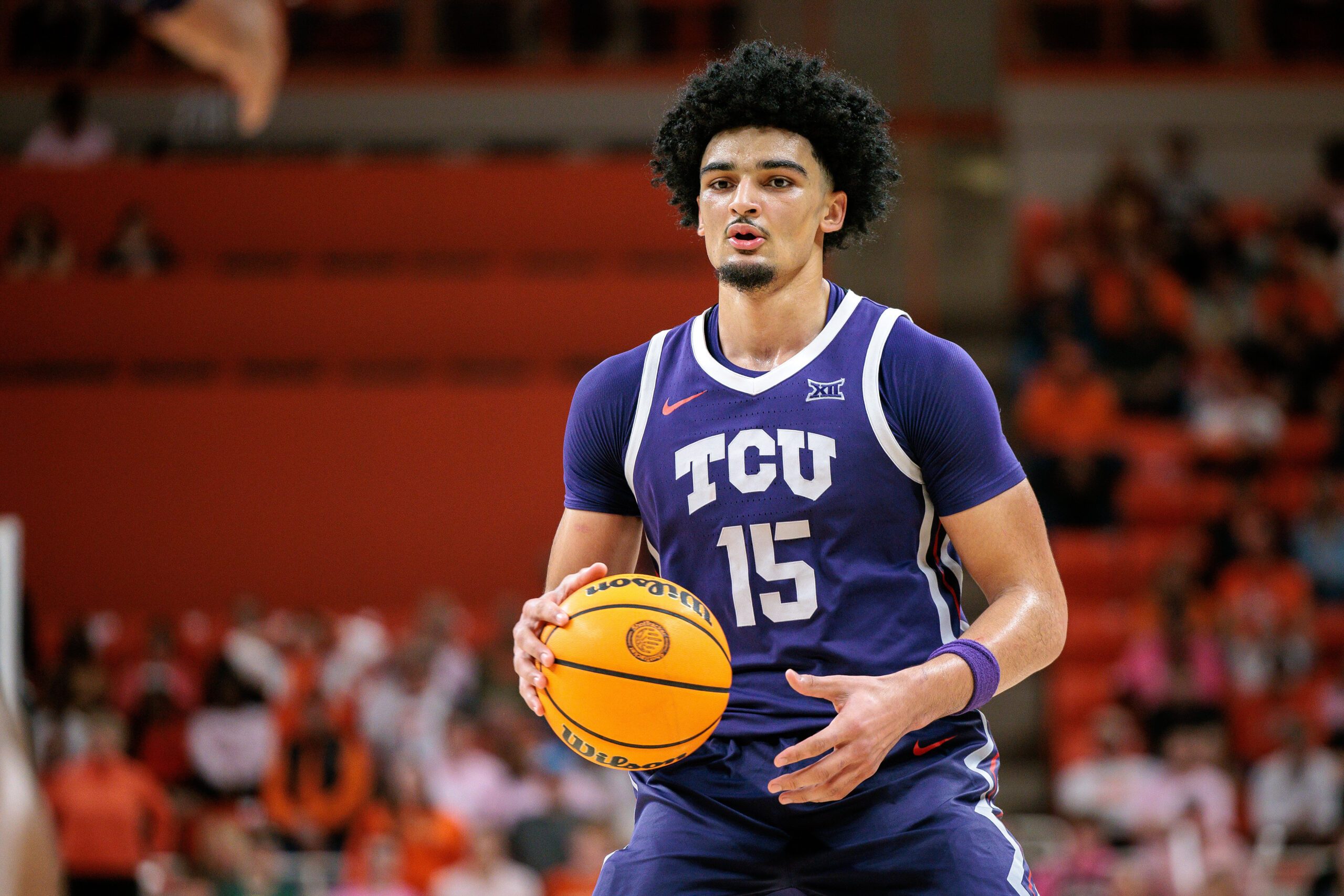Feb 14, 2026; Stillwater, Oklahoma, USA; TCU Horned Frogs forward David Punch (15) sets the play during the second half against the Oklahoma State Cowboys at Gallagher-Iba Arena. Mandatory Credit: William Purnell-Imagn Images