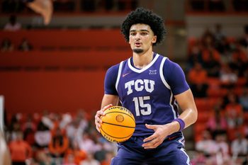 Feb 14, 2026; Stillwater, Oklahoma, USA; TCU Horned Frogs forward David Punch (15) sets the play during the second half against the Oklahoma State Cowboys at Gallagher-Iba Arena. Mandatory Credit: William Purnell-Imagn Images