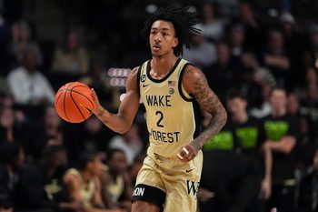 Feb 14, 2026; Winston-Salem, North Carolina, USA; Wake Forest Demon Deacons forward Juke Harris (2) brings the ball up court during the first half against the Stanford Cardinal at Lawrence Joel Veterans Memorial Coliseum. Mandatory Credit: Jim Dedmon-Imagn Images
