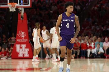 Feb 14, 2026; Houston, Texas, USA;  Kansas State Wildcats guard PJ Haggerty (4) celebrates his three point basket against the Houston Cougars in the first half at Fertitta Center. Mandatory Credit: Thomas Shea-Imagn Images