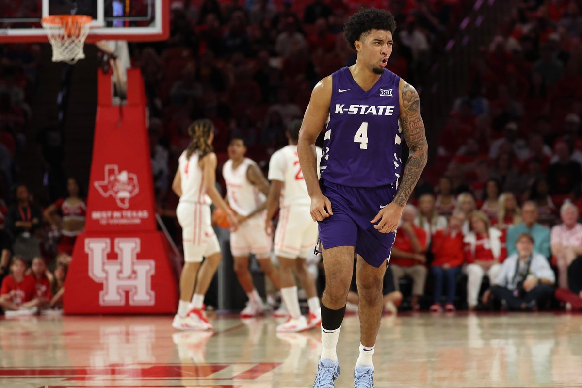 Feb 14, 2026; Houston, Texas, USA; Kansas State Wildcats guard PJ Haggerty (4) celebrates his three point basket against the Houston Cougars in the first half at Fertitta Center. Mandatory Credit: Thomas Shea-Imagn Images