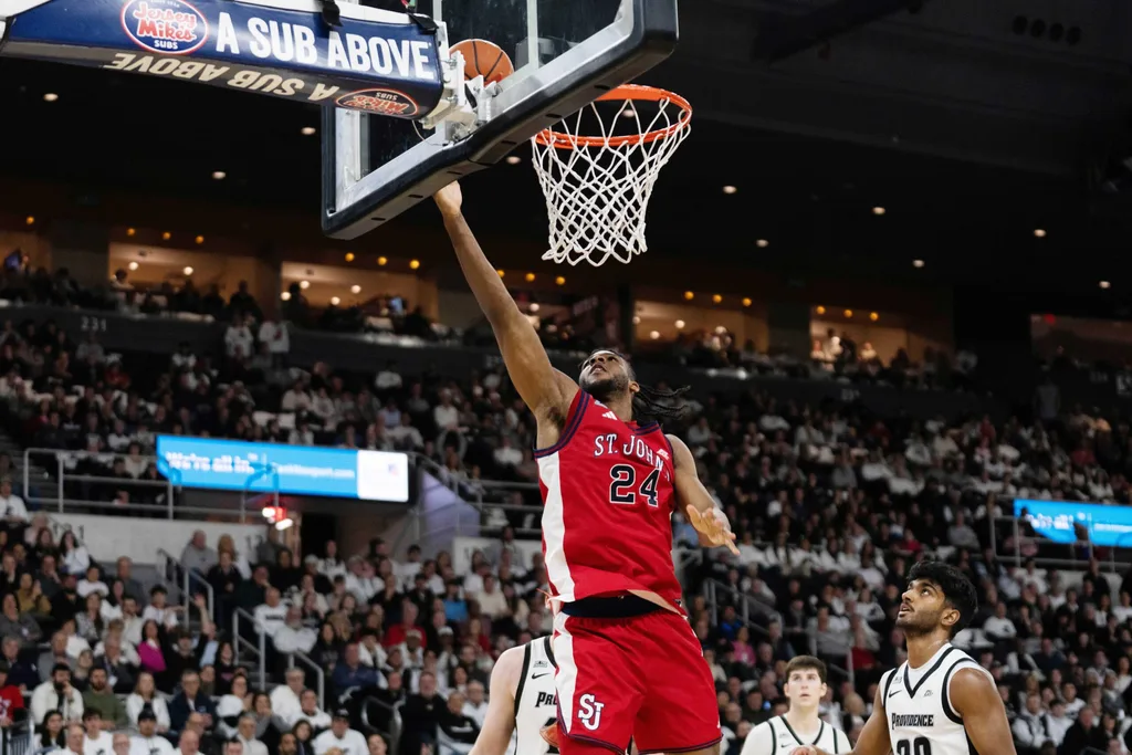 Feb 14, 2026; Providence, Rhode Island, USA; St. John’s University Red Storm forward Zuby Ejiofor (24) shoots during the second half of the game against the Providence College Friars at Amica Mutual Pavilion. Mandatory Credit: Natalie Reid-Imagn Images