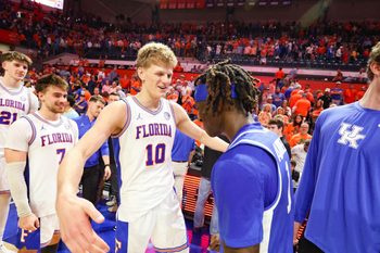 Florida forward Thomas Haugh (10) greats former Gator Kentucky guard Denzel Aberdeen (1) after a NCAA mens basketball game at Steven C. O'Connell Center Exactek arena in Gainesville, FL on Saturday, February 14, 2026. [Alan Youngblood/Gainesville Sun]