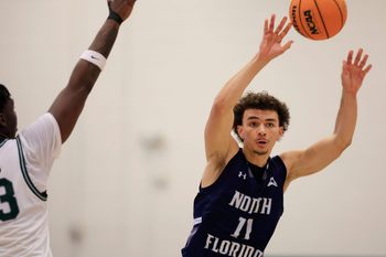 North Florida Ospreys guard Kamrin Oriol (11) passes the ball during the second half of an NCAA men’s basketball game at Swisher Gymnasium, Saturday, Feb. 14, 2026, in Jacksonville, Fla. JU held off UNF 63-56. [Corey Perrine/Florida Times-Union]