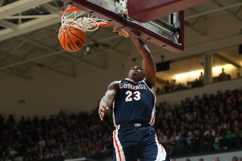 Feb 14, 2026; Santa Clara, California, USA; Gonzaga Bulldogs guard Adam Miller (23) dunks against the Santa Clara Broncos during the second half at Leavey Center. Mandatory Credit: Darren Yamashita-Imagn Images