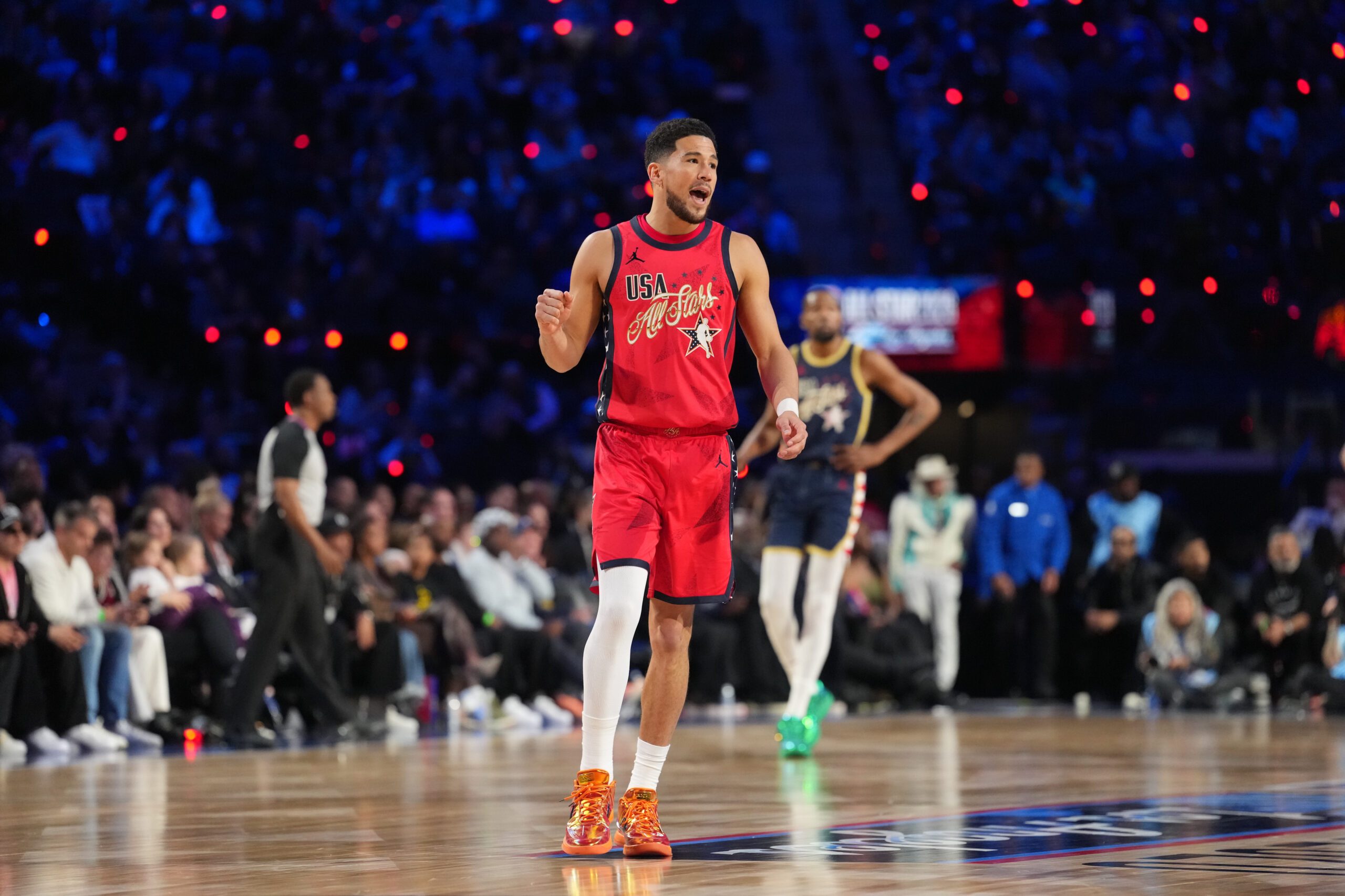 Feb 15, 2026; Inglewood, California, USA; Team USA Stars guard Devin Booker (1) of the Phoenix Suns reacts in game four against Team Stripes during the 75th NBA All Star Game at Intuit Dome. Mandatory Credit: Kirby Lee-Imagn Images