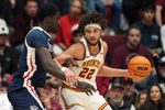 Feb 14, 2026; Santa Clara, California, USA; Santa Clara Broncos forward Allen Graves (22) dribbles against Gonzaga Bulldogs center Ismaila Diagne (left) during the second half at Leavey Center. Mandatory Credit: Darren Yamashita-Imagn Images