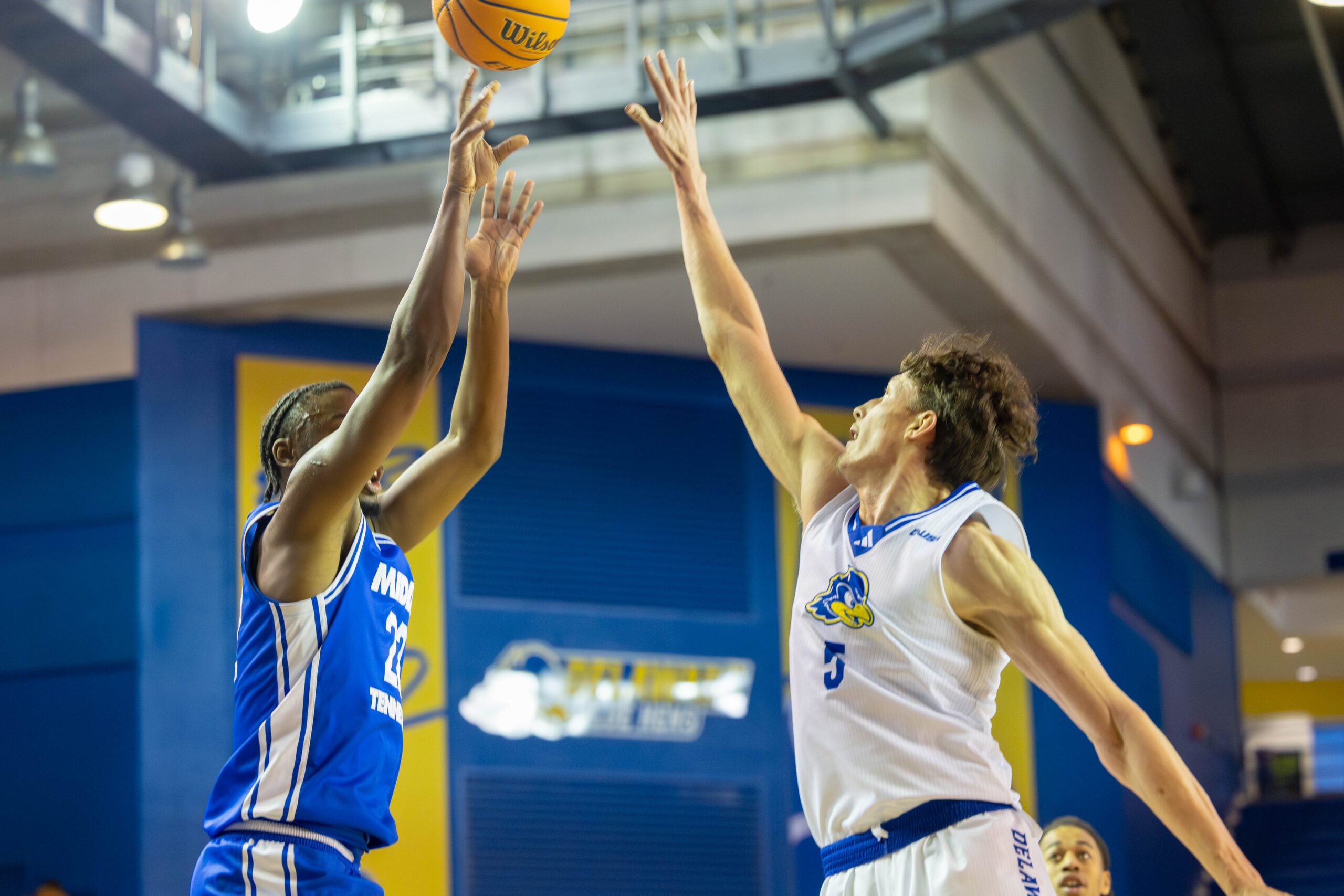 Middle Tennessee guard Kamari Lands (22) shoots over Delaware Hens forward Macon Emory (5) during the NCAA college basketball game between the Delaware Hens and the Middle Tennessee on Saturday, Feb. 7, 2026, at The Bob Carpenter Sports Convocation Center in Newark, Delaware.Middle Tennessee guard Kamari Lands (22) shoots over Delaware Hens forward Macon Emory (5) during the NCAA college basketball game between the Delaware Hens and the Middle Tennessee on Feb. 7, 2026, at The Bob Carpenter Center in Newark.