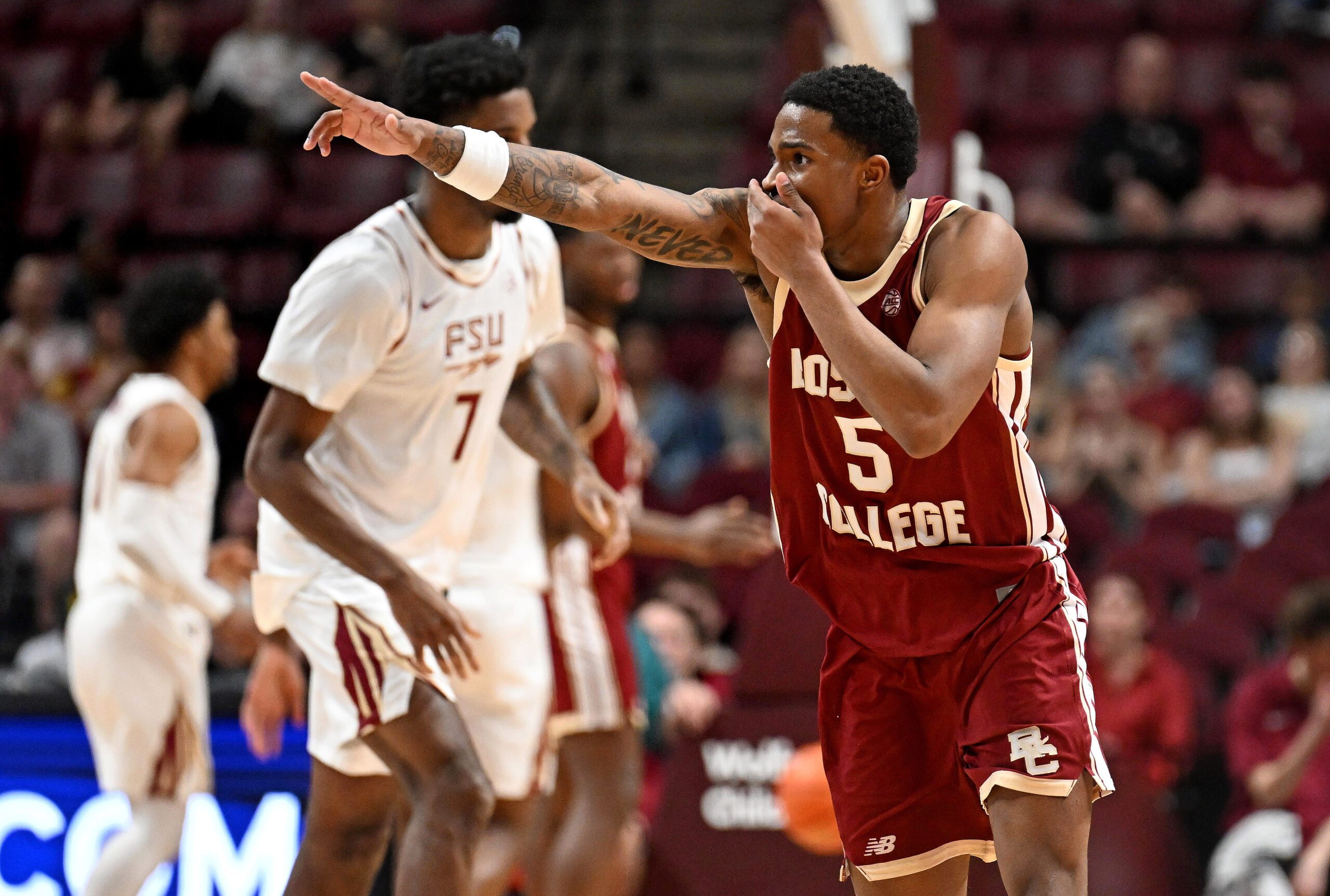 Feb 17, 2026; Tallahassee, Florida, USA; Boston College Eagles guard Fred Payne (5) celebrates making a three point shot during the first half against the Florida State Seminoles at Donald L. Tucker Center. Mandatory Credit: Melina Myers-Imagn Images