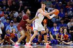 Feb 17, 2026; Gainesville, Florida, USA; Florida Gators center Micah Handlogten (3) posts up against South Carolina Gamecocks forward Elijah Strong (31) during the first half at Exactech Arena at the Stephen C. O'Connell Center. Mandatory Credit: Matt Pendleton-Imagn Images