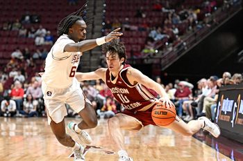 Feb 17, 2026; Tallahassee, Florida, USA; Boston College Eagles guard Luka Toews (10) drives the ball to the net against Florida State Seminoles guard Robert McCray (6) during the second half at Donald L. Tucker Center. Mandatory Credit: Melina Myers-Imagn Images