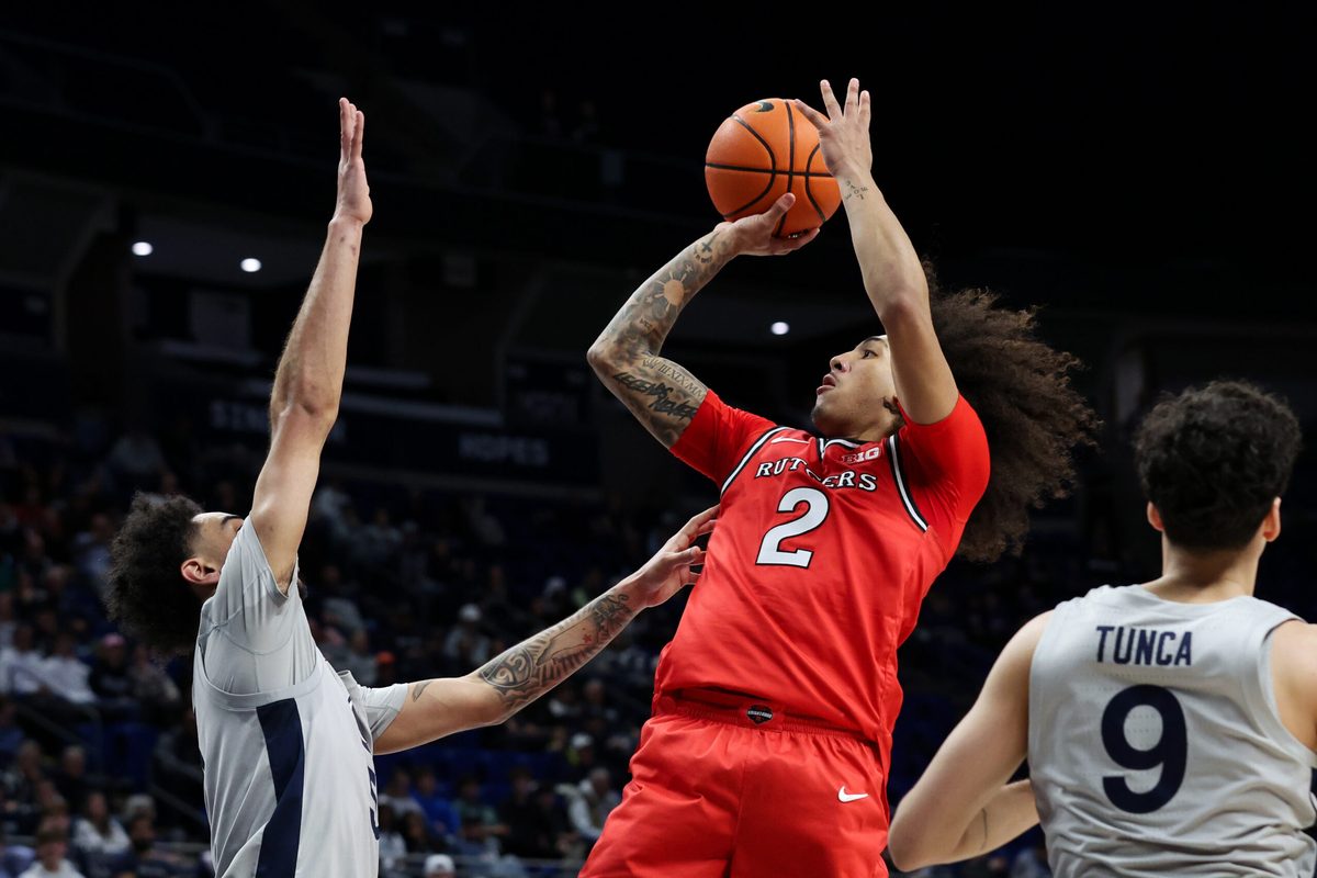 Feb 18, 2026; University Park, Pennsylvania, USA; Rutgers Scarlet Knights guard Lino Mark (2) shoots the ball as Penn State Nittany Lions guard Freddie Dilione V (5) defends during the second half at Bryce Jordan Center. Mandatory Credit: Matthew O'Haren-Imagn Images