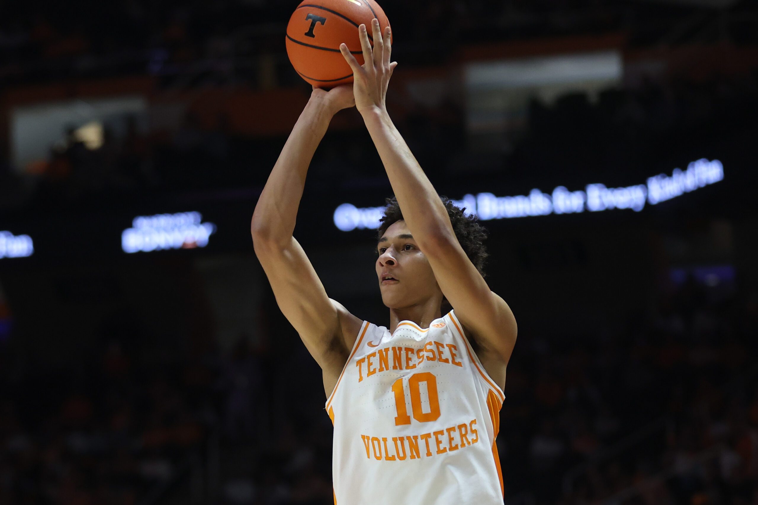 Feb 18, 2026; Knoxville, Tennessee, USA;  Tennessee Volunteers forward Nate Ament (10) shoots a three pointer against the Oklahoma Sooners during the first half at Thompson-Boling Arena at Food City Center. Mandatory Credit: Randy Sartin-Imagn Images