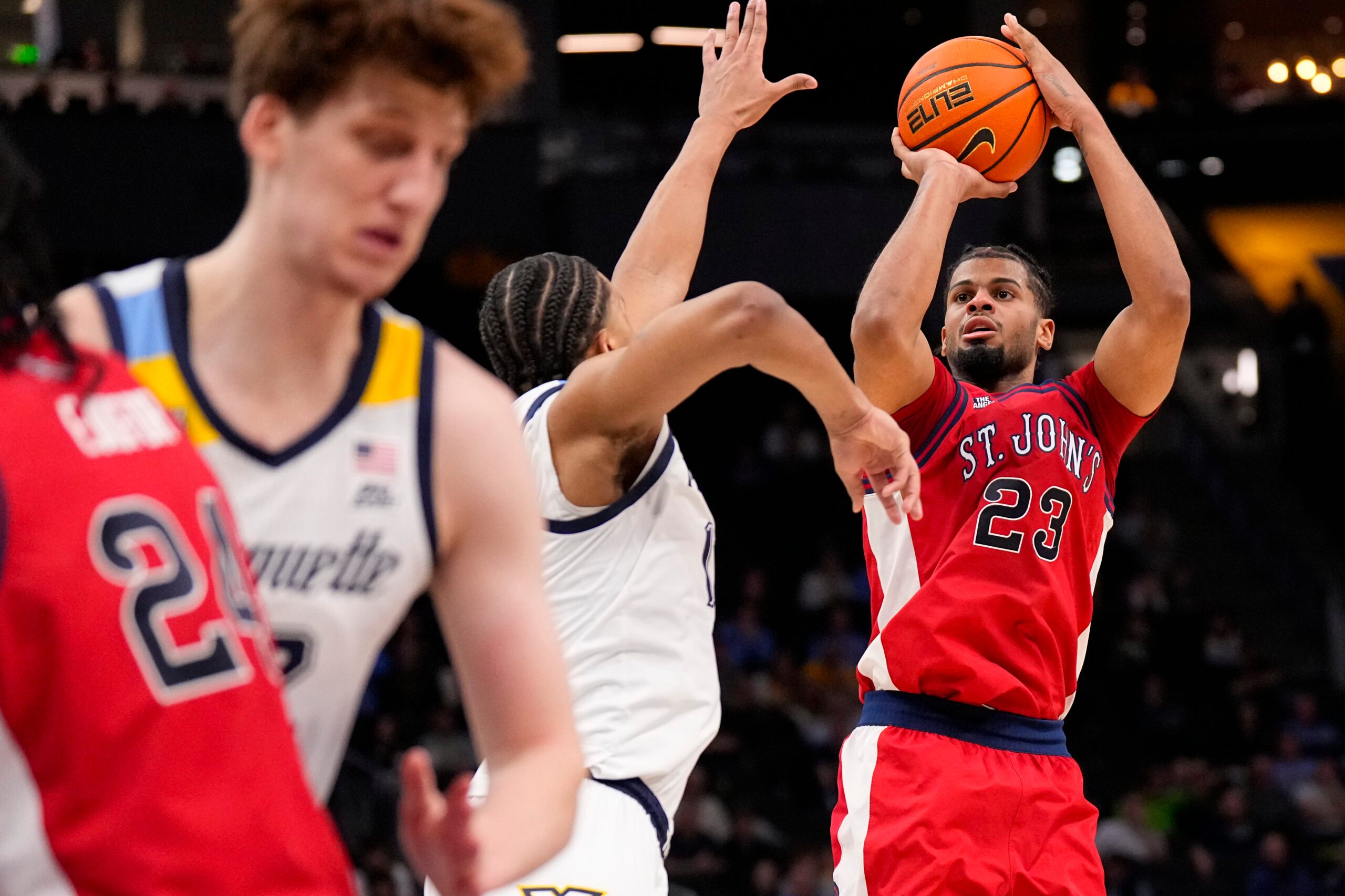 Feb 18, 2026; Milwaukee, Wisconsin, USA;  St. John’s Red Storm guard-forward Bryce Hopkins (23) shoots during the first half against the Marquette Golden Eagles at Fiserv Forum. Mandatory Credit: Jeff Hanisch-Imagn Images