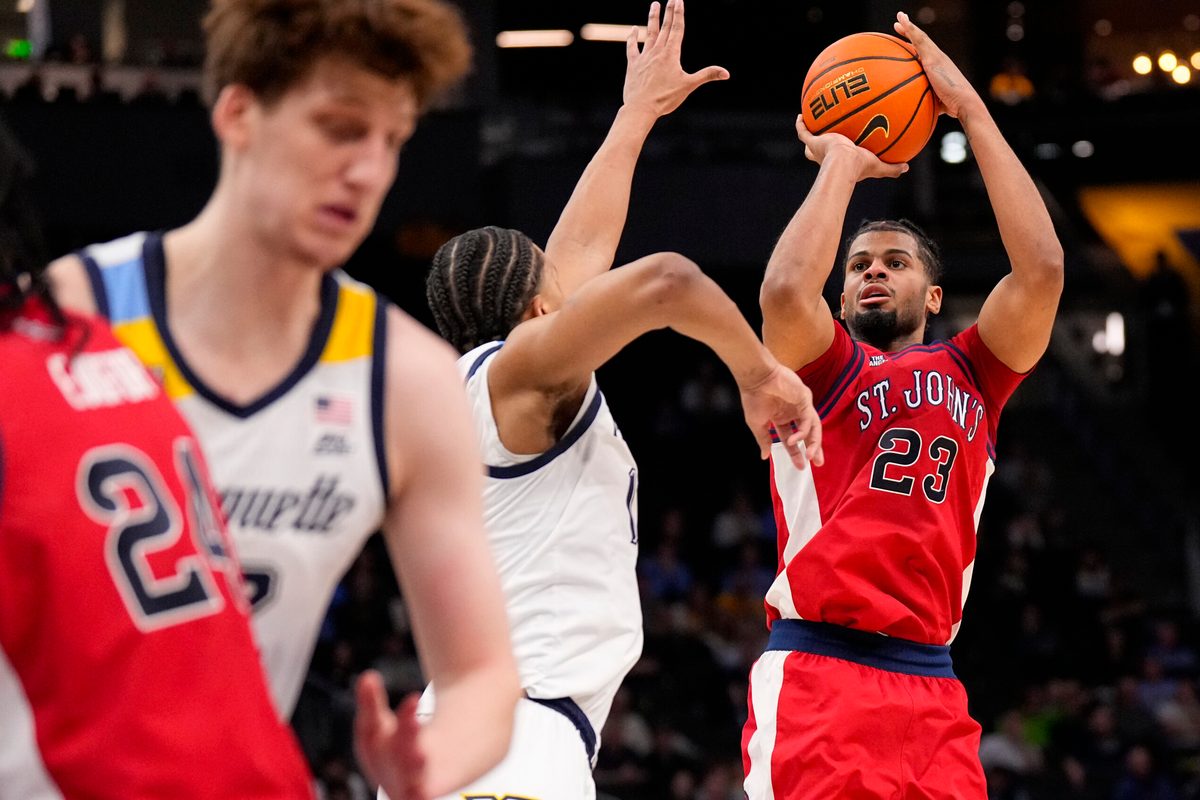 Feb 18, 2026; Milwaukee, Wisconsin, USA;  St. John’s Red Storm guard-forward Bryce Hopkins (23) shoots during the first half against the Marquette Golden Eagles at Fiserv Forum. Mandatory Credit: Jeff Hanisch-Imagn Images