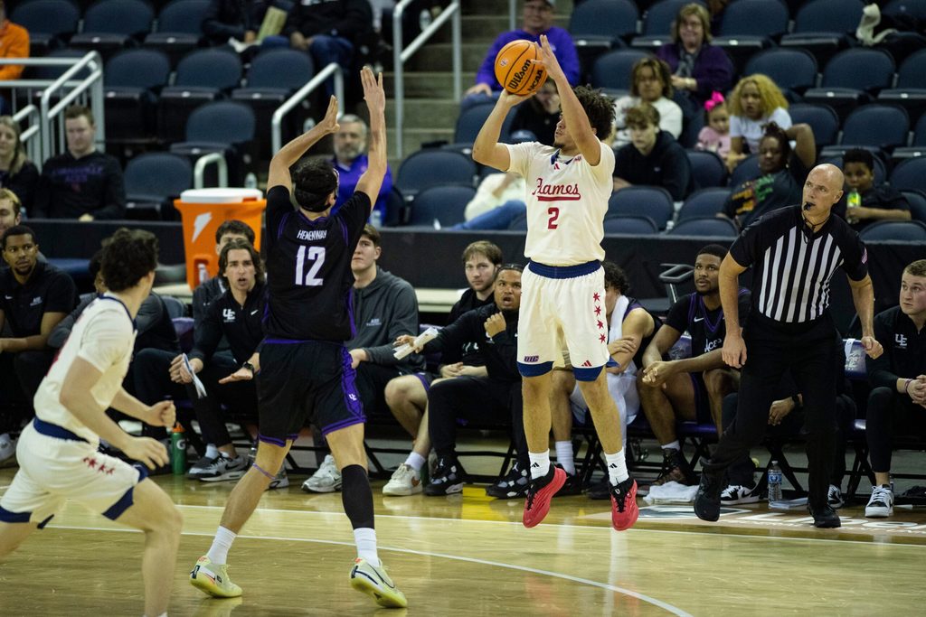 Illinois Chicago's Elijah Crawford (2) takes a three-point shot as the University of Evansville Purple Aces play the University of Illinois Chicago Flames at Ford Center in Evansville, Ind., Wednesday, Feb. 18, 2026.