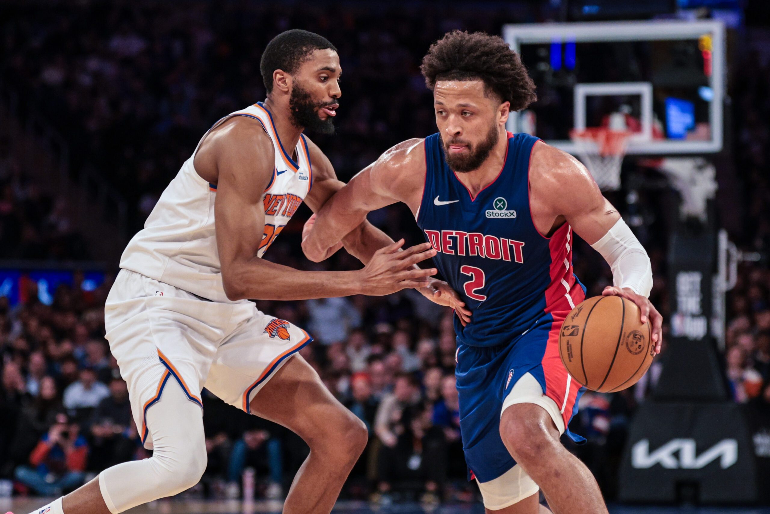 Feb 19, 2026; New York, New York, USA; Detroit Pistons guard Cade Cunningham (2) is guarded by New York Knicks guard Mikal Bridges (25) during the second half at Madison Square Garden. Mandatory Credit: Vincent Carchietta-Imagn Images