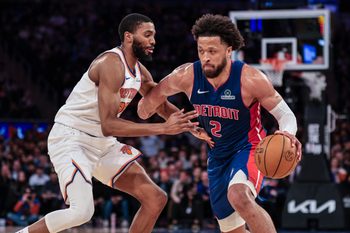 Feb 19, 2026; New York, New York, USA; Detroit Pistons guard Cade Cunningham (2) is guarded by New York Knicks guard Mikal Bridges (25) during the second half at Madison Square Garden. Mandatory Credit: Vincent Carchietta-Imagn Images