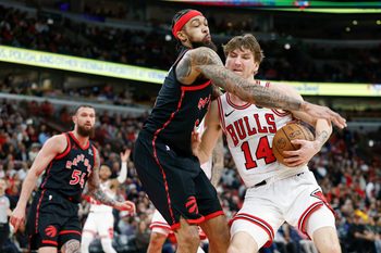 Feb 19, 2026; Chicago, Illinois, USA; Toronto Raptors forward Brandon Ingram (3) defends against Chicago Bulls forward Matas Buzelis (14) during the second half at United Center. Mandatory Credit: Kamil Krzaczynski-Imagn Images