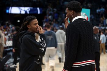 Feb 20, 2026; Memphis, Tennessee, USA; Memphis Grizzlies guard Ja Morant (left) and Utah Jazz forward Jaren Jackson Jr. (right) talk after a game at FedExForum. Mandatory Credit: Petre Thomas-Imagn Images