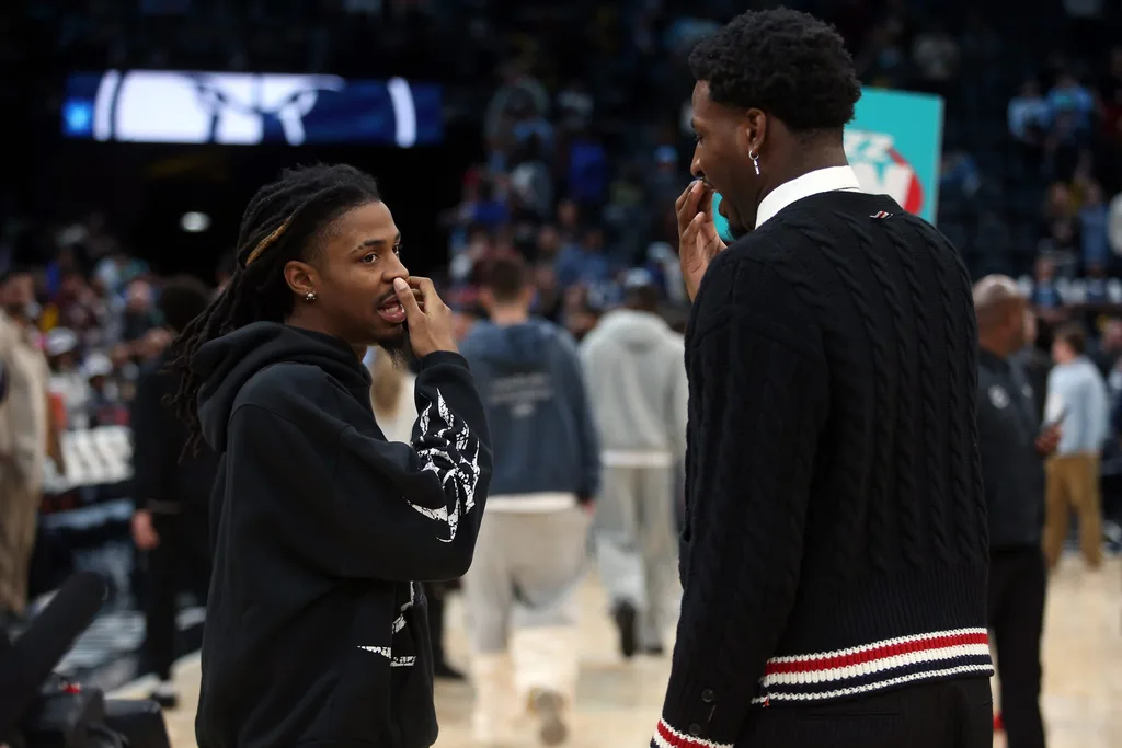 Feb 20, 2026; Memphis, Tennessee, USA; Memphis Grizzlies guard Ja Morant (left) and Utah Jazz forward Jaren Jackson Jr. (right) talk after a game at FedExForum. Mandatory Credit: Petre Thomas-Imagn Images