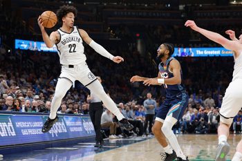 Feb 20, 2026; Oklahoma City, Oklahoma, USA; Brooklyn Nets forward Jalen Wilson (22) leaps to save the ball from going out of bounds against the Oklahoma City Thunder during the second half at Paycom Center. Mandatory Credit: Alonzo Adams-Imagn Images